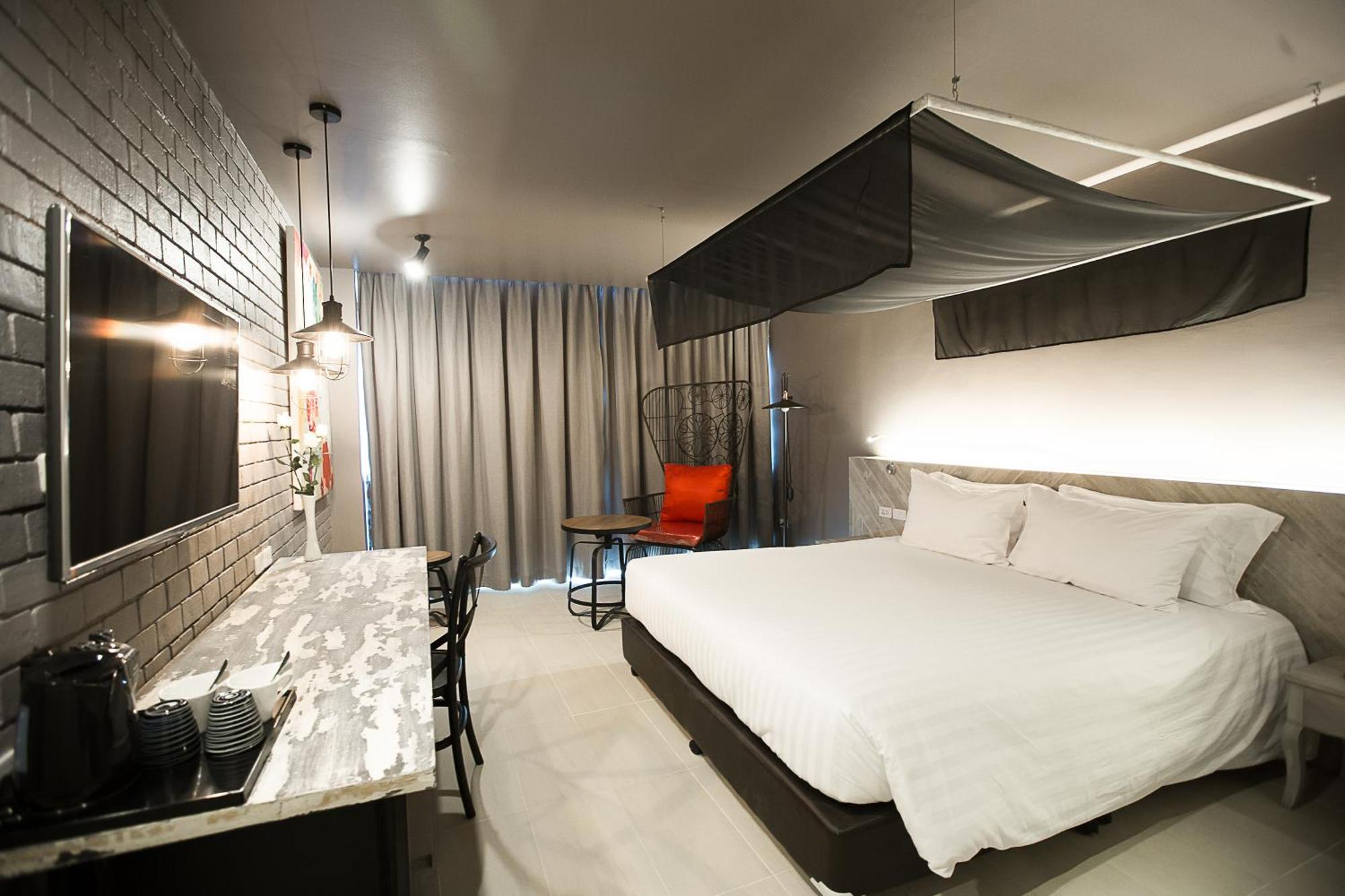 Art Mai Gallery Nimman Hotel Чиангмай Экстерьер фото A room at the hotel